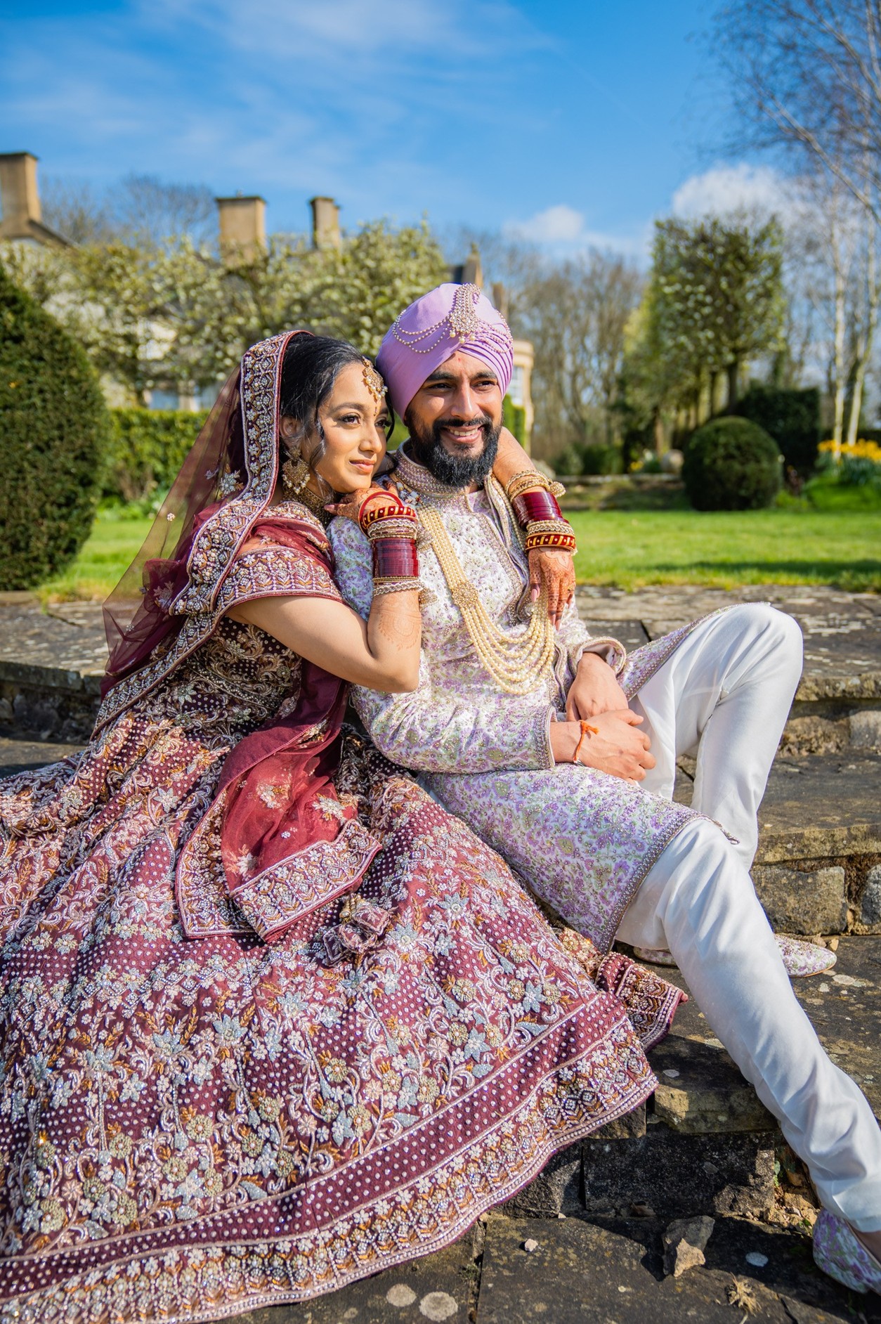 Ladywood Estate Bride and Groom sitting down on steps